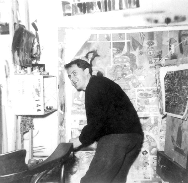 Öyvind Fahlström in his New York studio with his work "Sitting..." Photo by Billy Klüver
