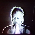 Performers: K.J. Holmes, Houston-Jones - <a href="https://redesign.cathyweis.org/performance-histories/march-14-1994" target="outside">DIA Center for the Arts 1994</a> <br/>Still from video by: Tal Yarden