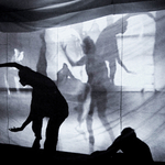 <span class='italic'>Ghosts</span> by Cathy Weis - <a href="https://redesign.cathyweis.org/calendar/may-7-2017-performance-by-cathy-weis" target="outside">May 7, 2017</a> <br/>Still from video by Davidson Gigliotti