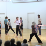 Sally Silvers with group — <a href="https://redesign.cathyweis.org/calendar/april-30-2017-sara-rudner-and-sally-silvers" target="outside">April 30, 2017</a>
<br/>
Still from video by Davidson Gigliotti